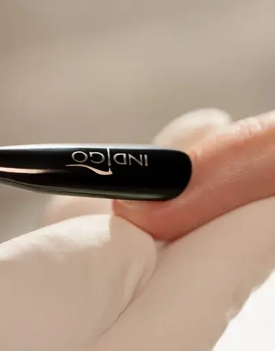 Black two-sided cuticle pusher